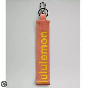 Pink and yellow lululemon never lost key chain